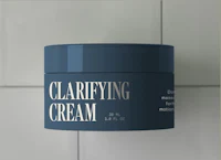 clarifying cream on a tiled wall